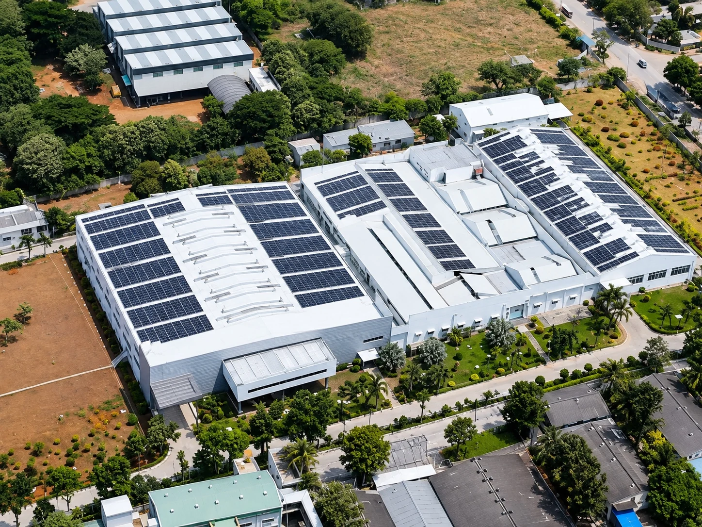 Aerial view of Pattabi Enterprises' rooftop solar panel installation
